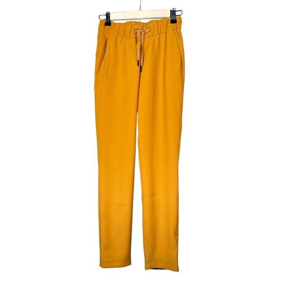 LULULEMON On the Fly 7/8 Woven Pant 27” in Fools Gold - Picture 13 of 13